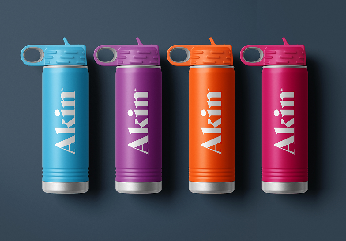 New Akin brand on four water bottles