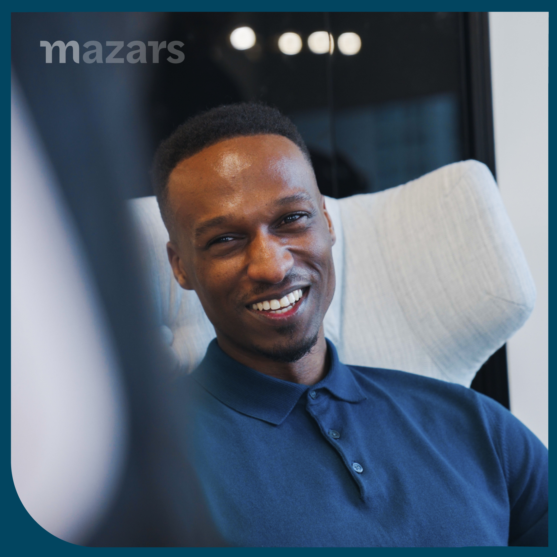 Mazars employee smiling at camera