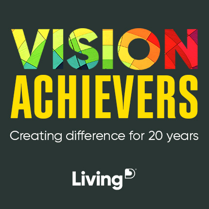 Graphic with the phrase "Vision Achievers" in bold, bright text on a dark background. Below, a tagline reads "Creating difference for 20 years" in smaller, white font. 